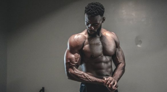 A guy posing with removes body hair